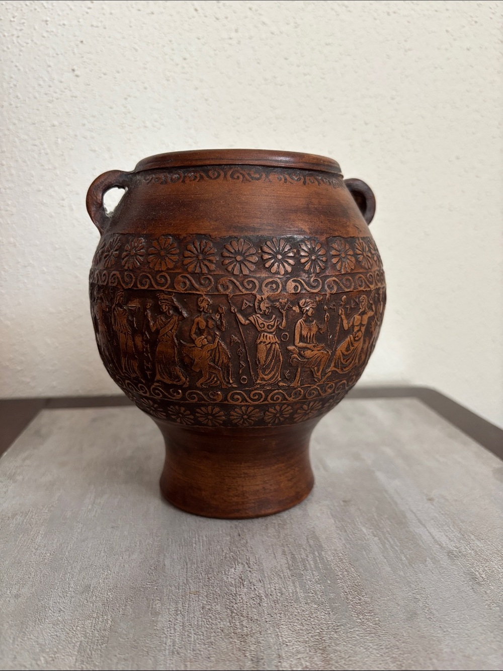 Ornate Brown Ceramic Vase with Carved Relief Design